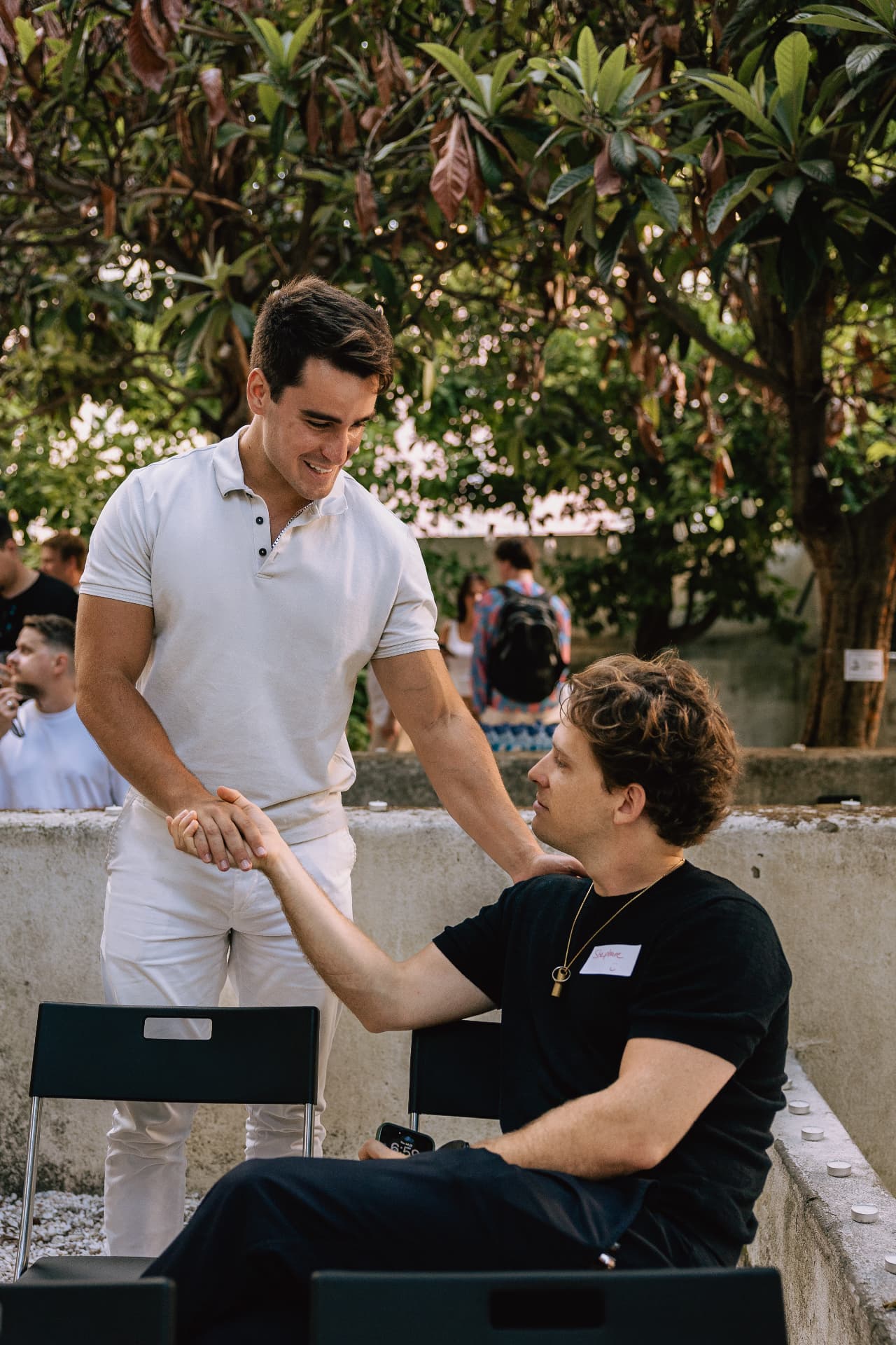 Founders shaking hands at a Founders Fire event