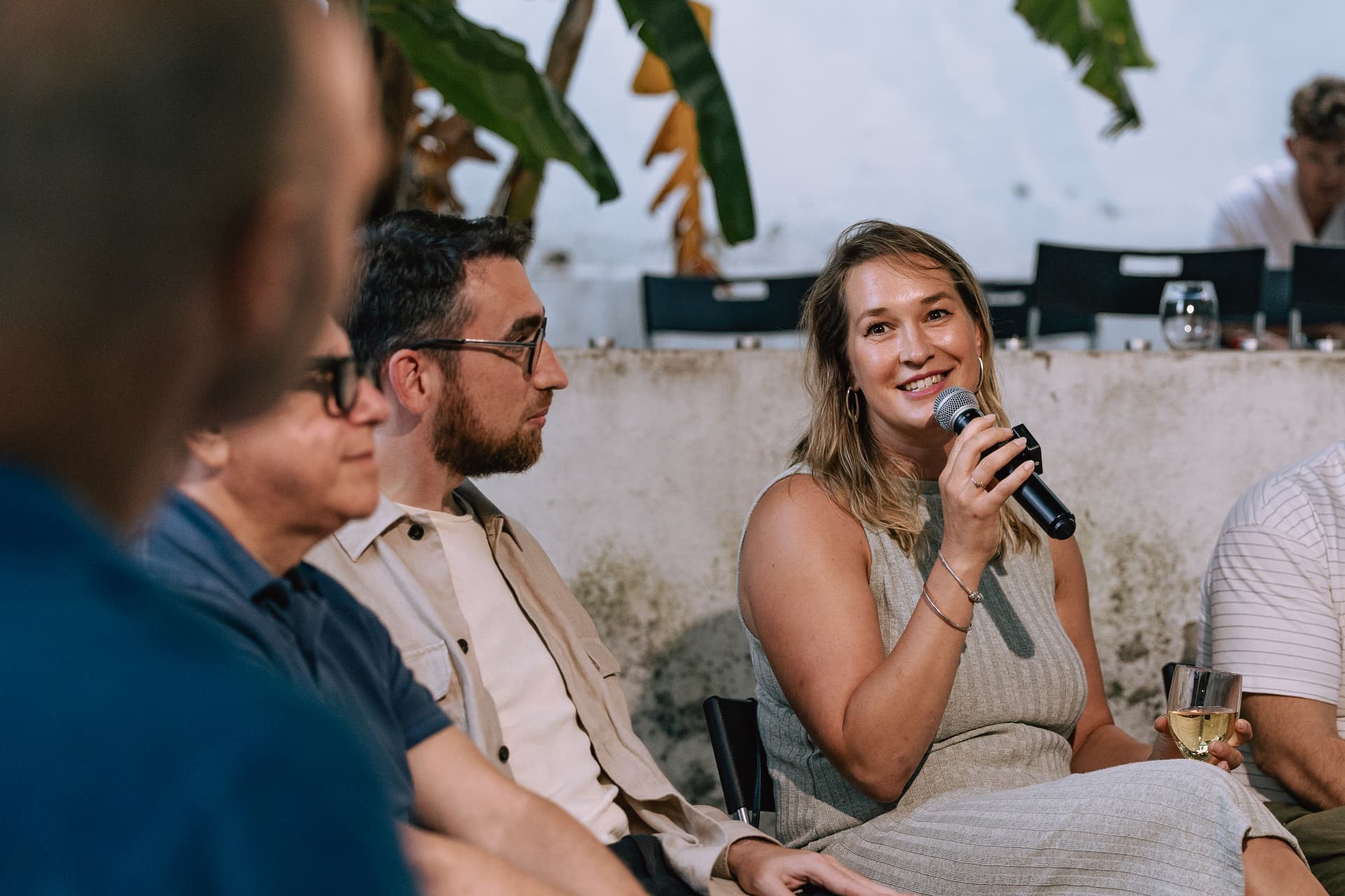 Panelist speaking into a microphone