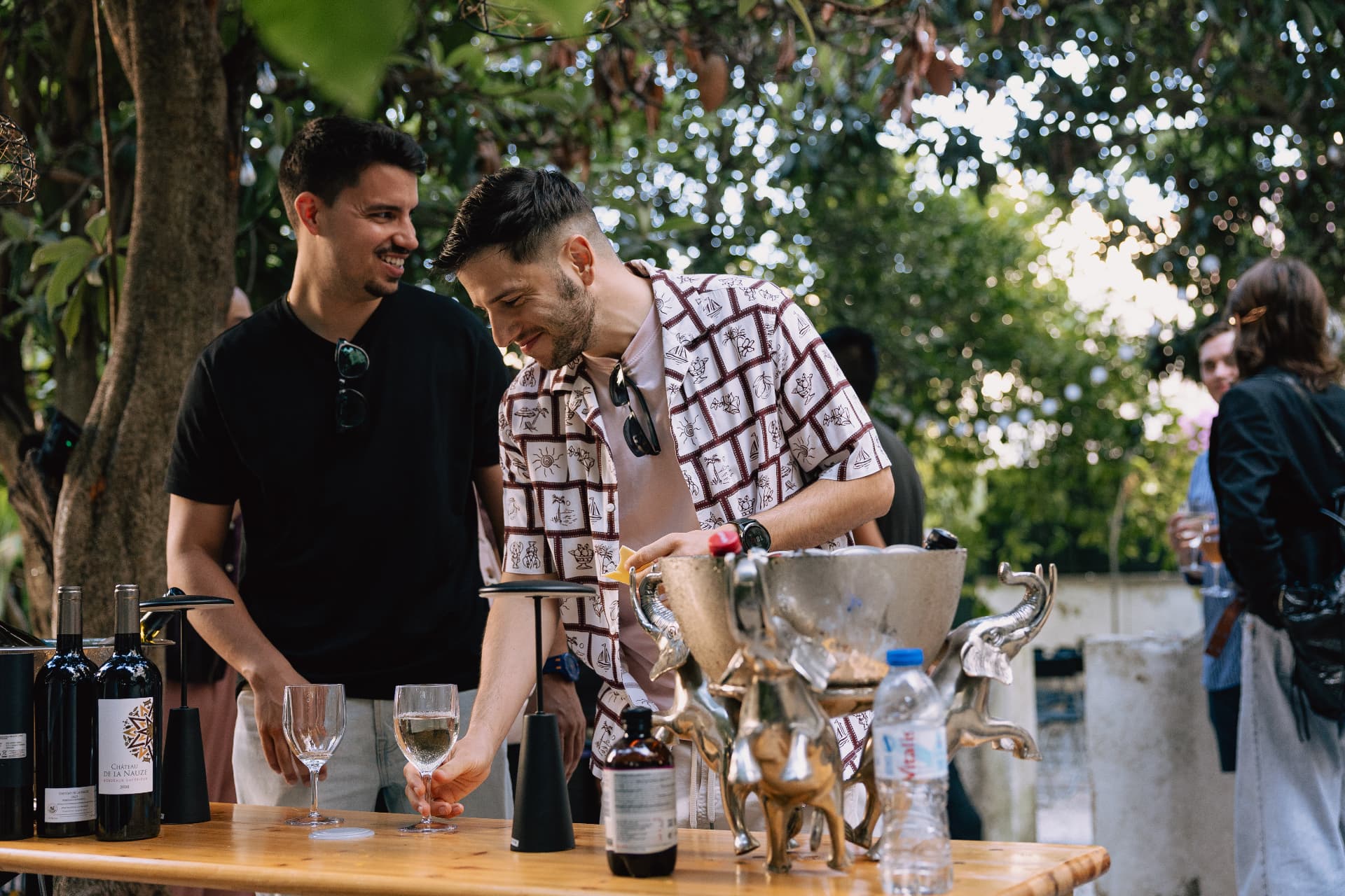 Founders talking over drinks at a Founders Fire event